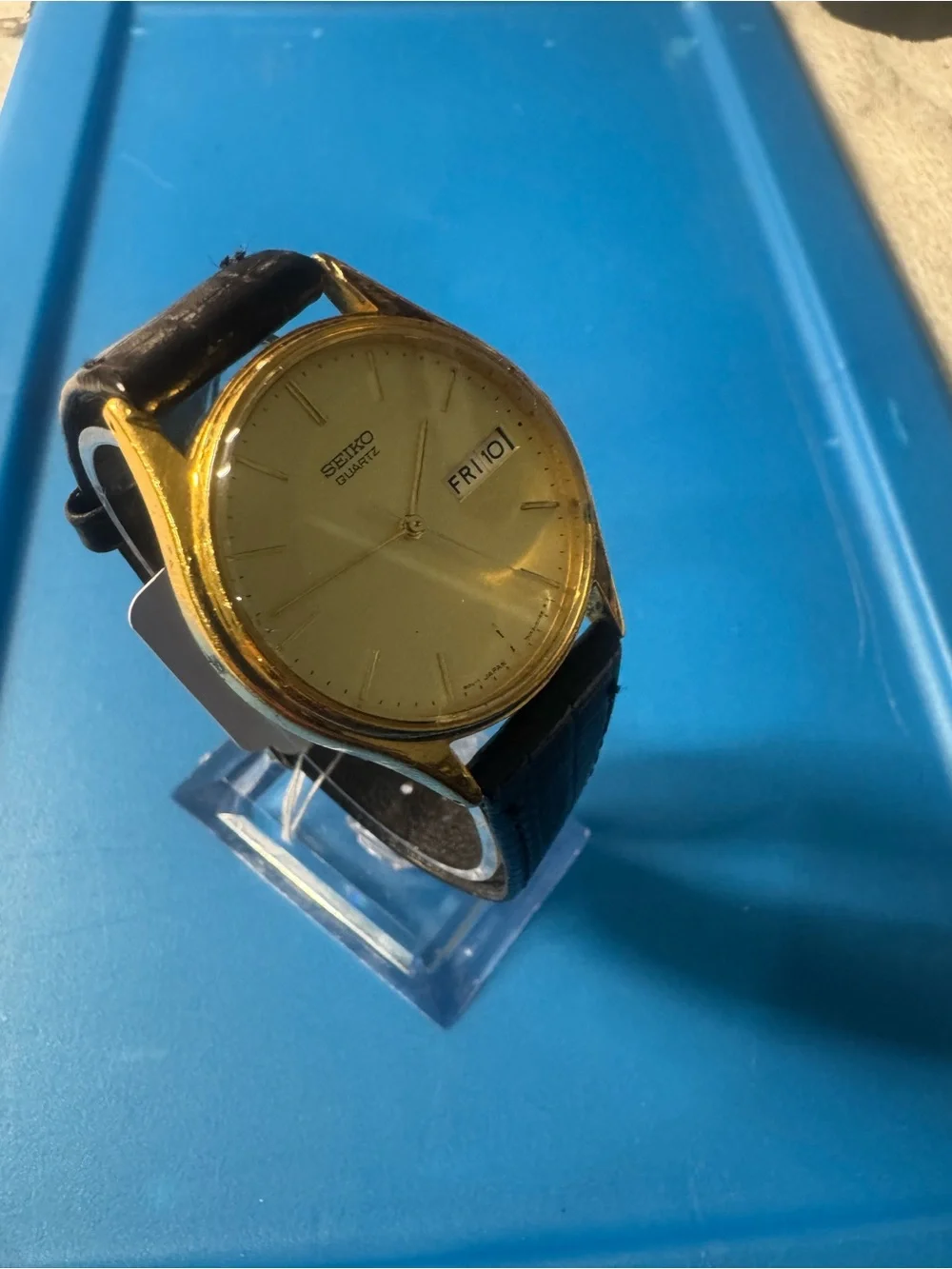 Seiko Gold Dial Watch with Black Strap